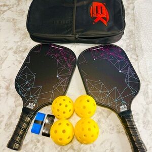 Lightweight Graphite Carbon Fiber Set, 2 Outdoor 2
Indoor Balls, 2 Grip Tapes 🏓